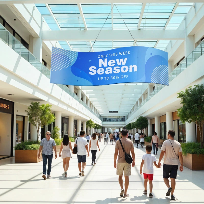 Custom fabric hanging sign with distinctive S-curve profile for high-impact trade show booth branding