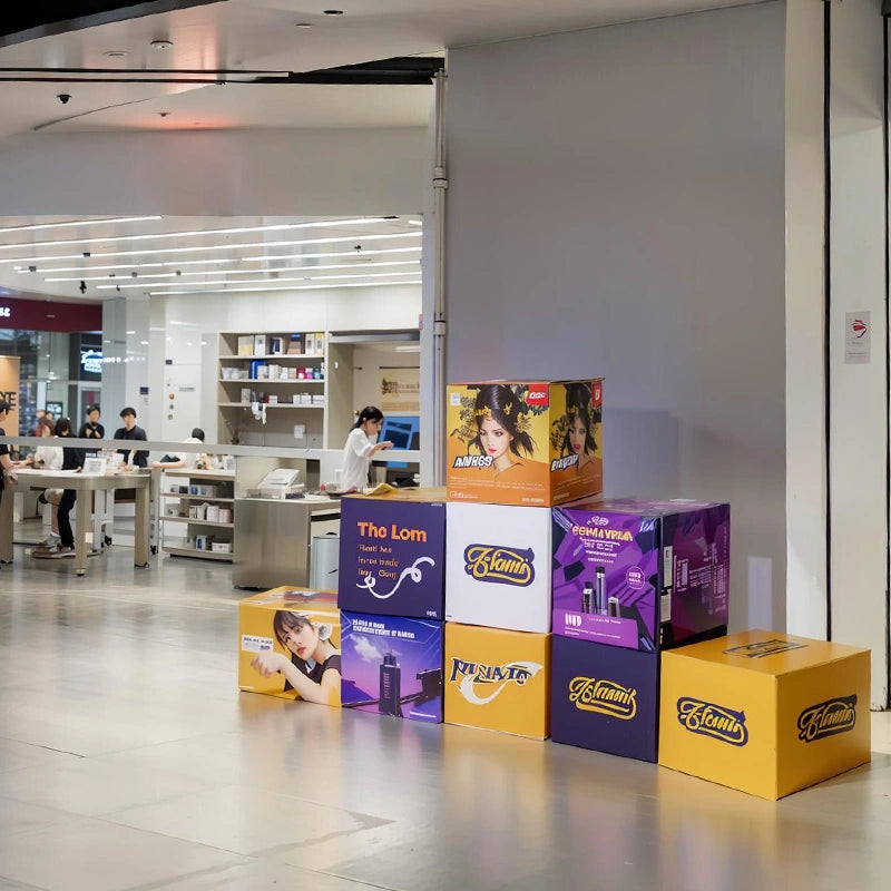 Portable 3D cube display with sturdy frame and seamless graphics