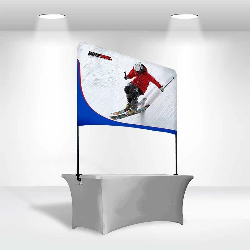 Retail counter banner stand with vibrant fabric print