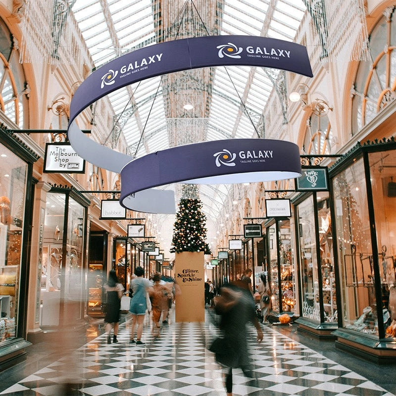 High visibility spiral hanging sign for expos