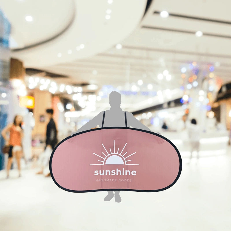 Back view of walking billboard highlighting support structure