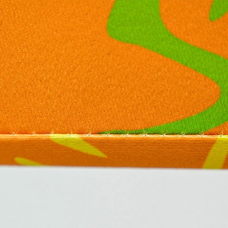 Portable 3D Slanted Arch Wall with lightweight aluminum frame and custom tension fabric graphic.