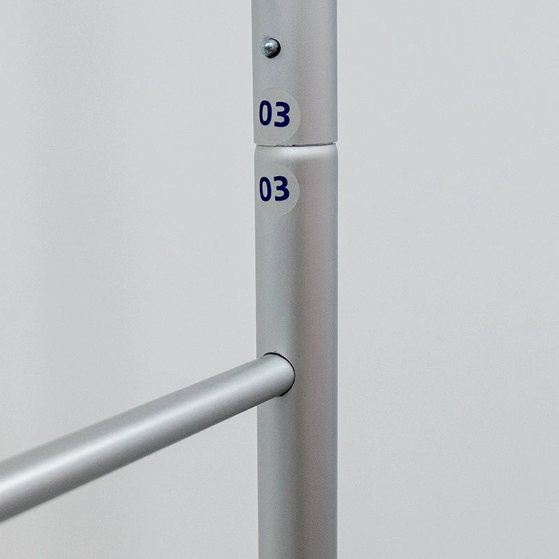 Magnetic fabric banner stands forming L-shaped booth design