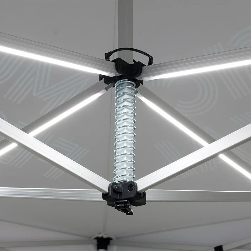 Custom illuminated canopy tent with integrated LEDs for evening events and outdoor brand promotions.