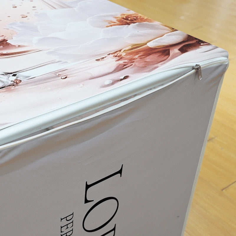 Freestanding tower display with multi-sided custom graphics for trade show booths, entrances, and event spaces