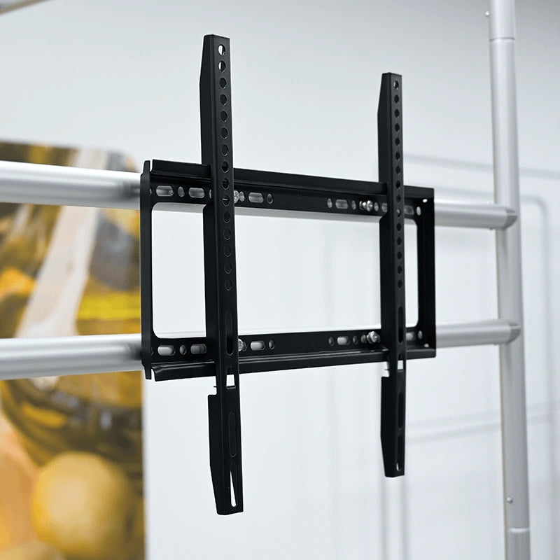 L-shaped trade show display with integrated shelving and TV mount for engaging product demonstrations