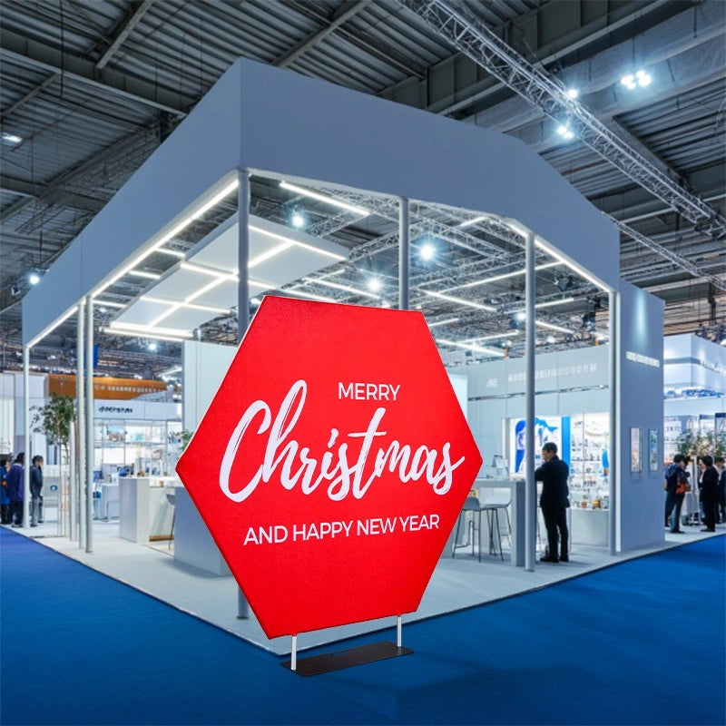 Hexagon Event Backdrop with vibrant custom graphics creating a modern focal point for trade shows and special events