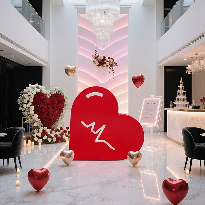 Dimensional heart backdrop with vibrant tension fabric graphics for Valentine’s Day events, proposals, and weddings.